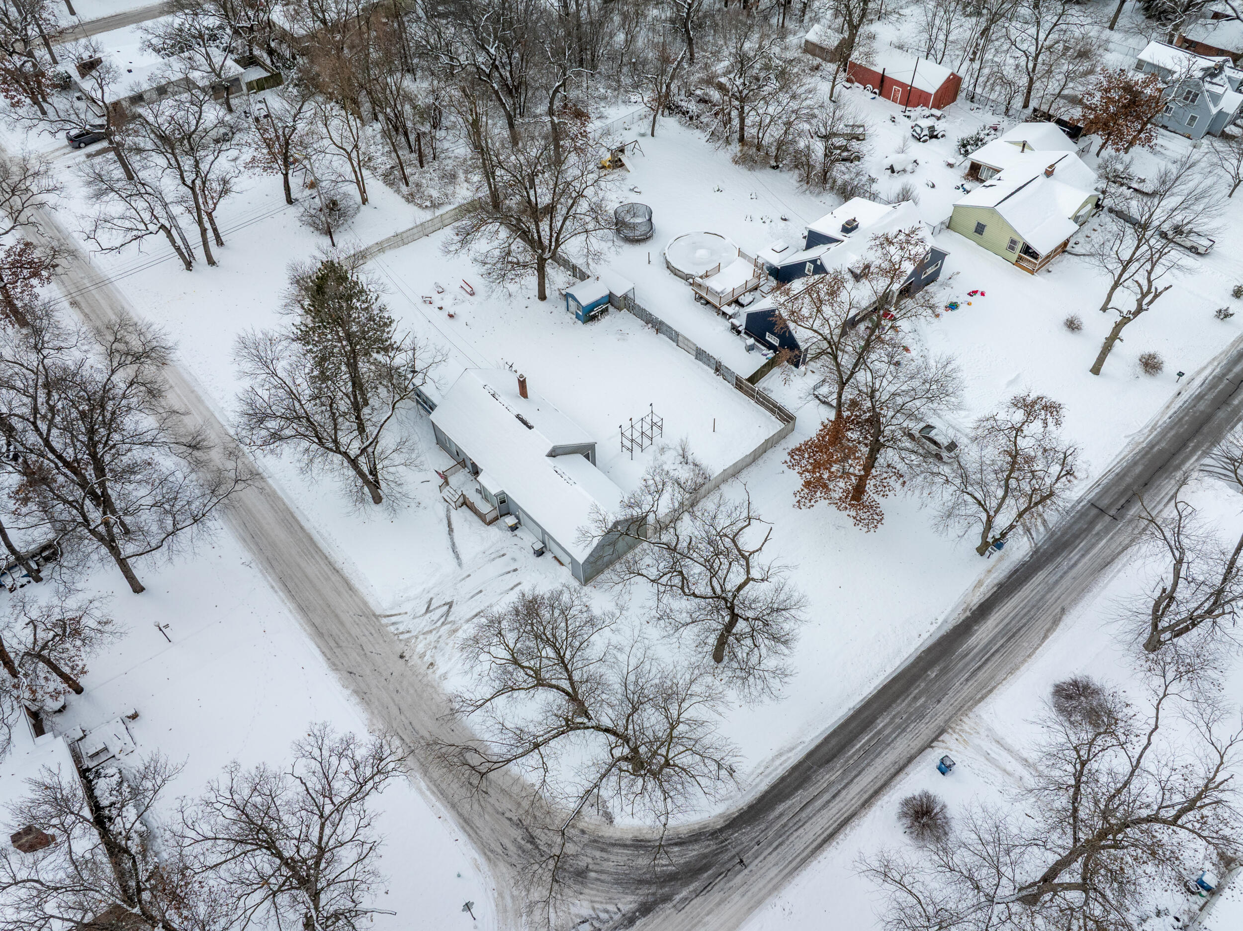 2321 Crest Road Gary, IN 46408 - Photo 21 of 22 a view of a tree with snow on the road