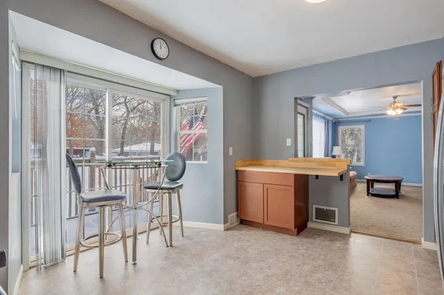 a view of a room with furniture window and wooden floor