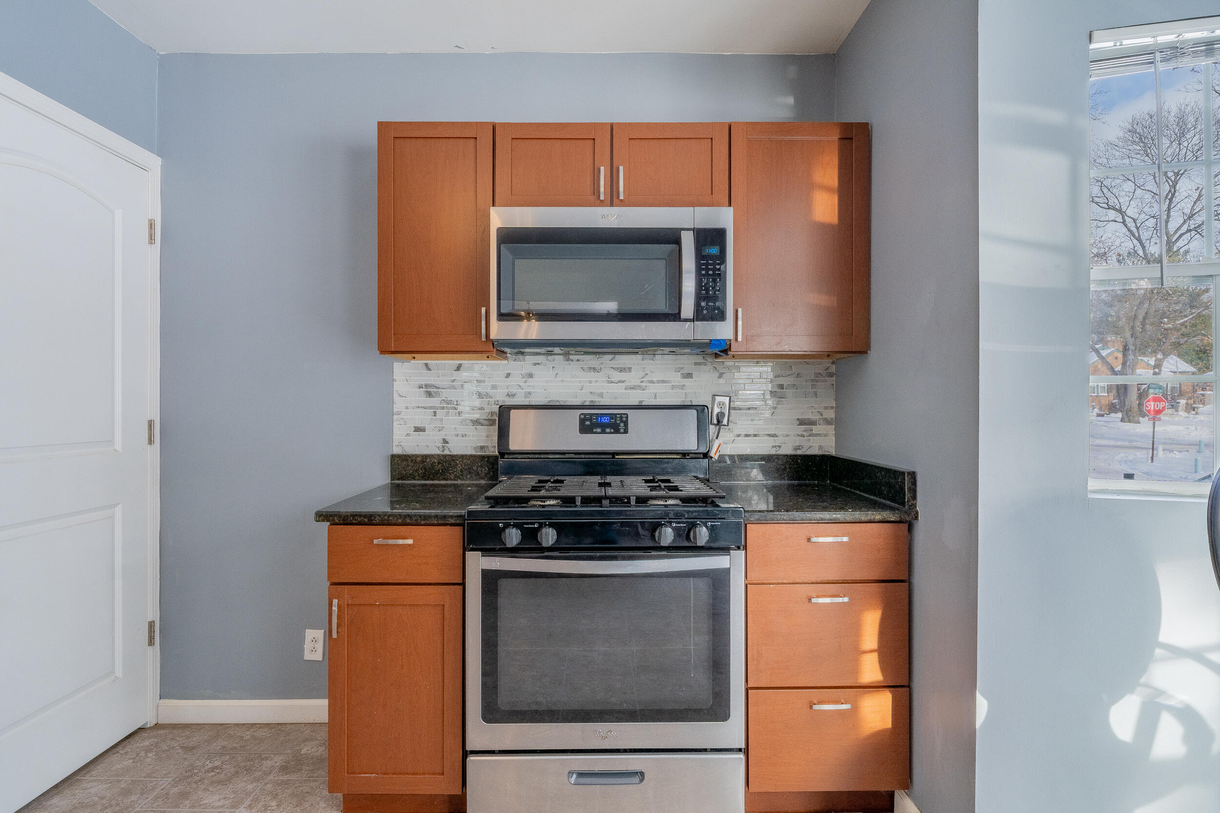 2321 Crest Road Gary, IN 46408 - Photo 10 of 22 a kitchen with a stove and a microwave