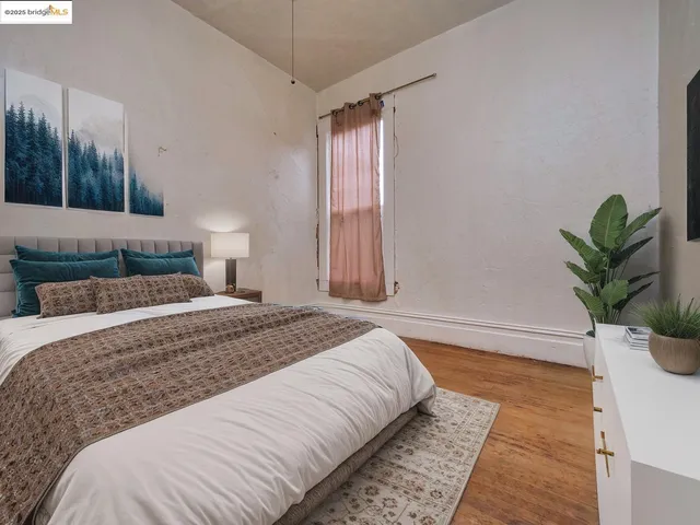 a view of wooden floor and brick walls