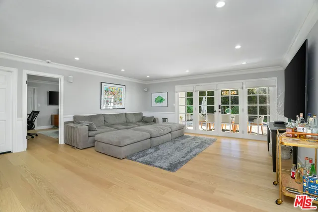 a living room with furniture and a couch