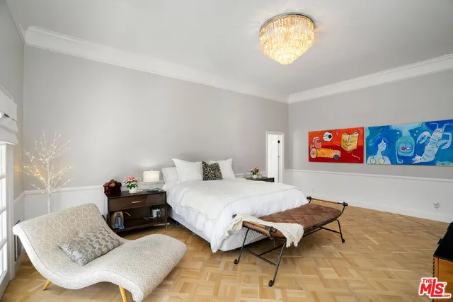 a bathroom with a double vanity sink mirror and