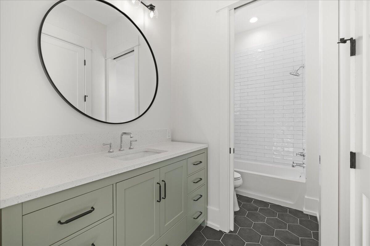 115 Native Tree Lane Santa Rosa Beach, FL 32459 - Photo 11 of 65 a bathroom with a sink a vanity and a mirror