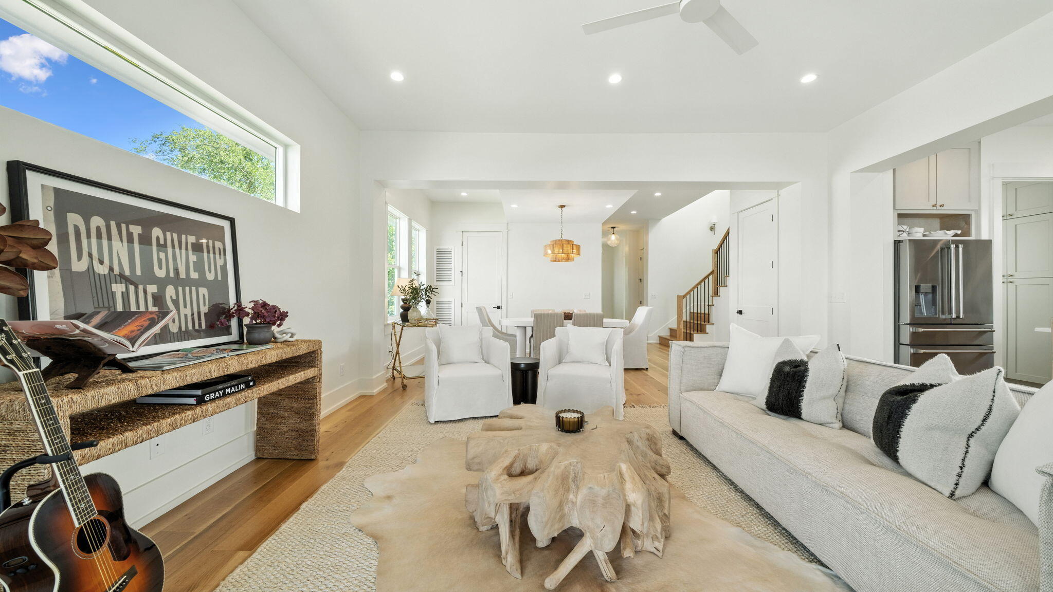 115 Native Tree Lane Santa Rosa Beach, FL 32459 - Photo 13 of 65 a living room with furniture windows and a fireplace