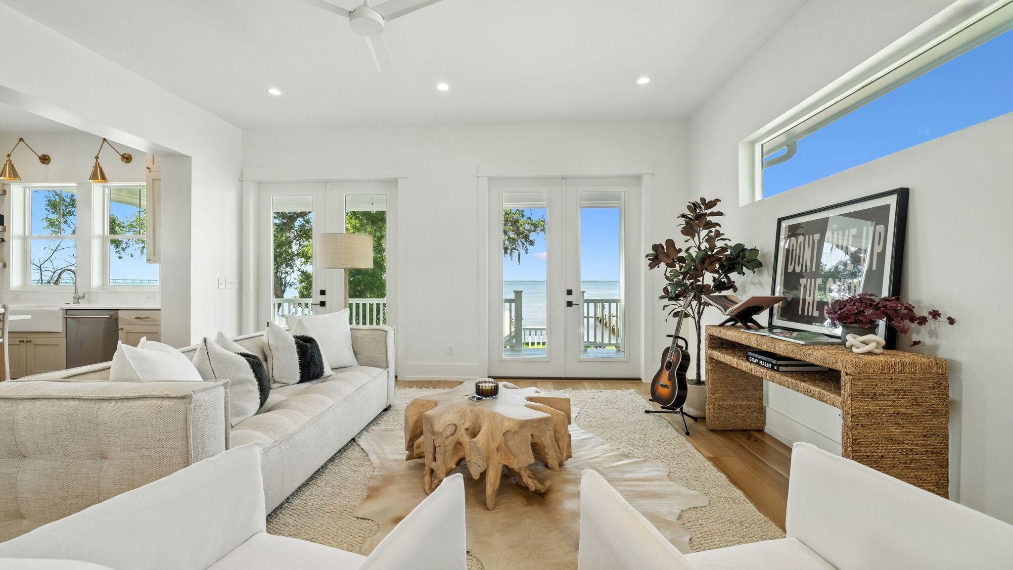 115 Native Tree Lane Santa Rosa Beach, FL 32459 - Photo 16 of 65 a living room with furniture and a large window