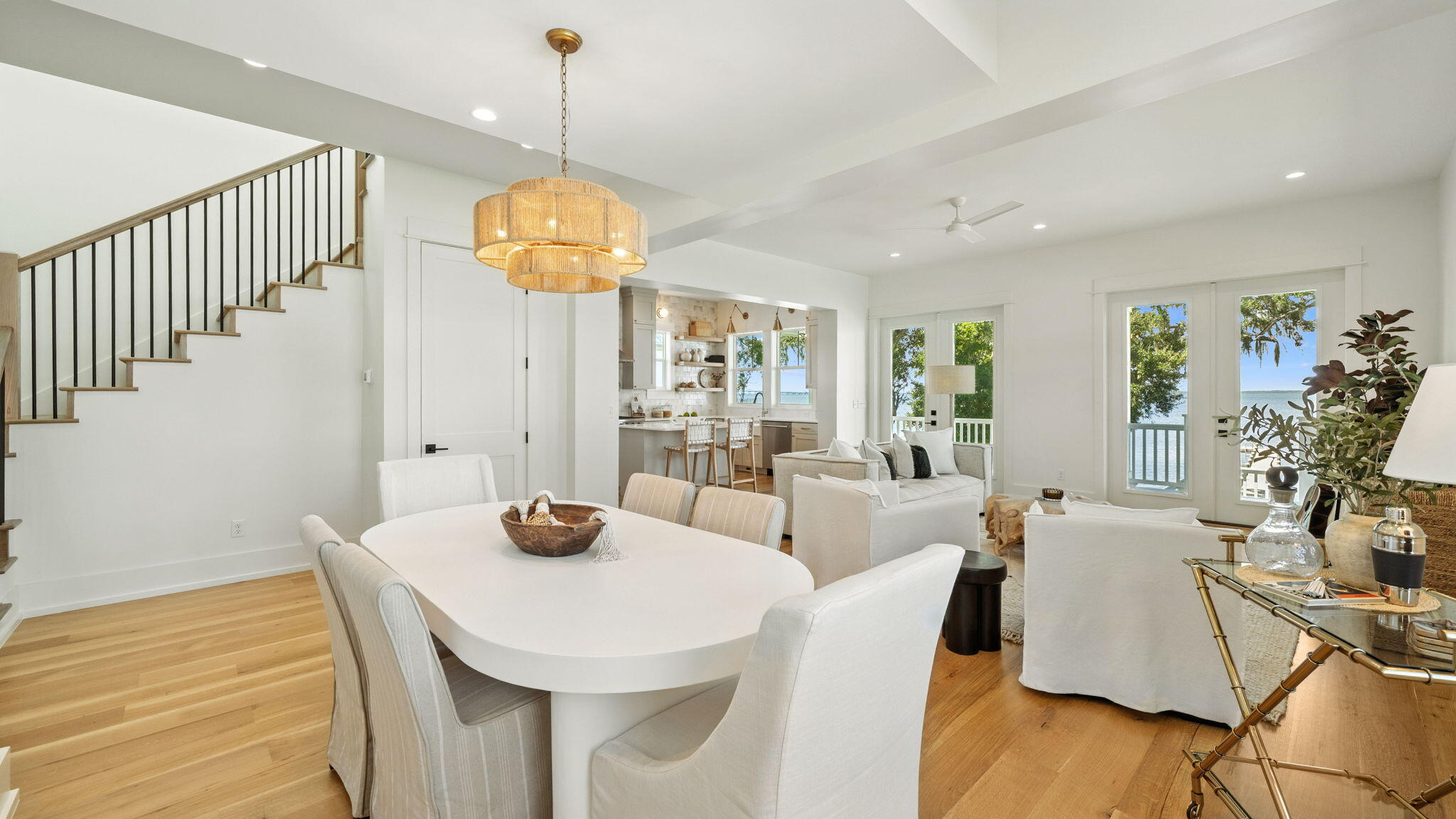 115 Native Tree Lane Santa Rosa Beach, FL 32459 - Photo 18 of 65 a view of a dining room with furniture window and wooden floor
