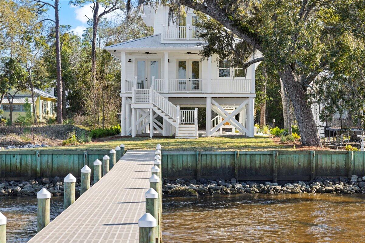 115 Native Tree Lane Santa Rosa Beach, FL 32459 - Photo 50 of 65 a view of a fountain in front of a house