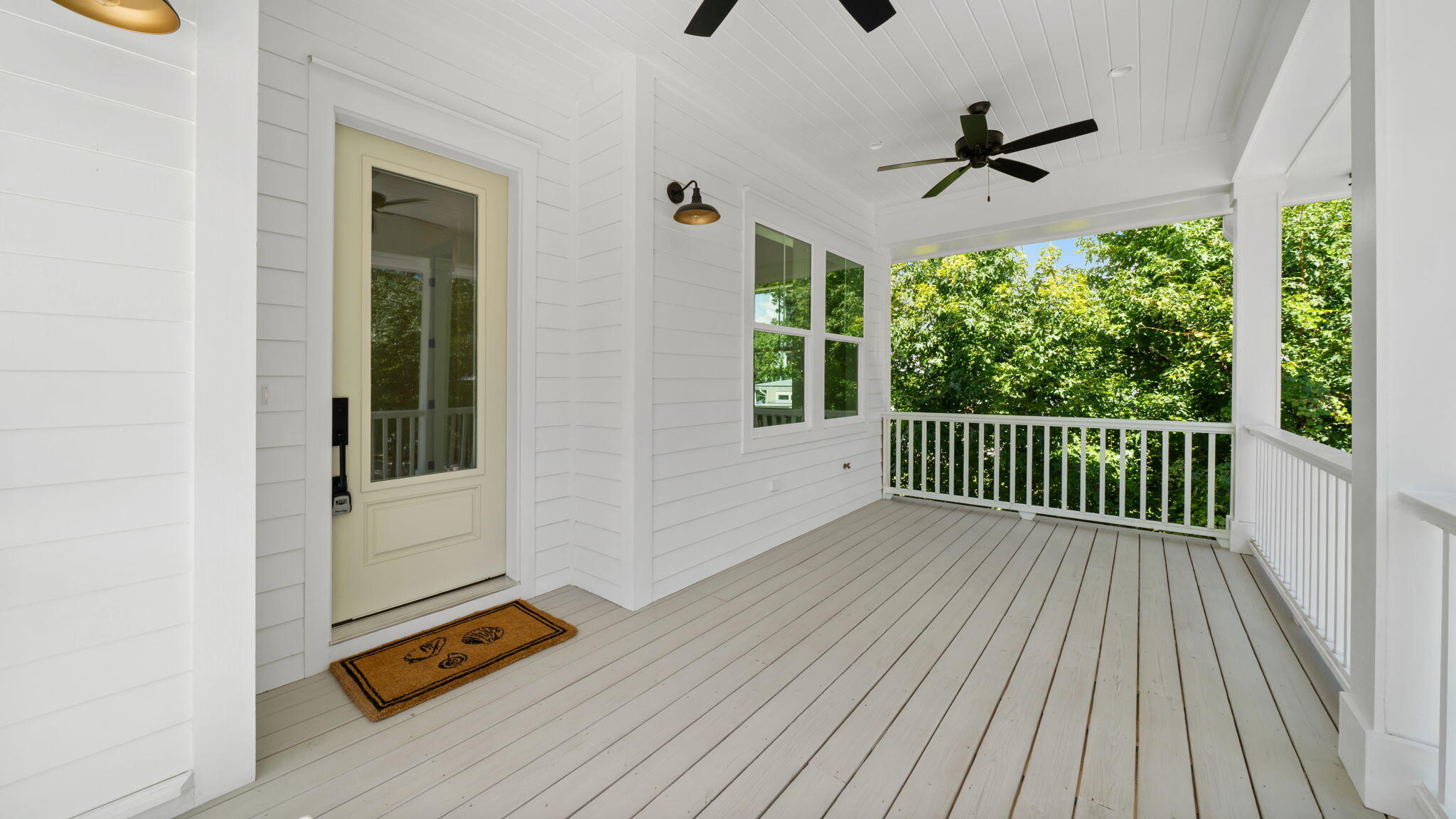 115 Native Tree Lane Santa Rosa Beach, FL 32459 - Photo 5 of 65 a view of outdoor space with wooden floor and windows