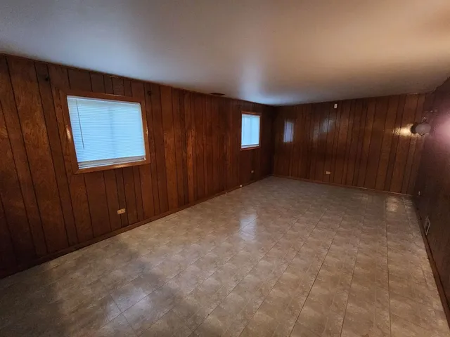 a view of an empty room with yellow walls