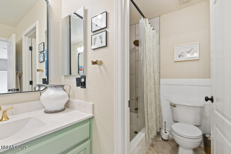 2968 Fox Trail Drive Reno, NV 89523 - Photo 18 of 24 a bathroom with a sink toilet and shower
