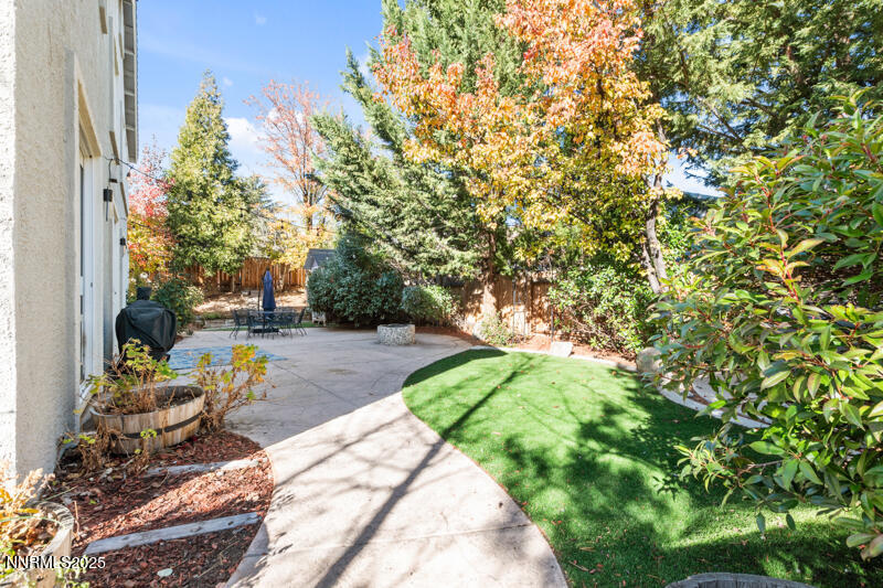 2968 Fox Trail Drive Reno, NV 89523 - Photo 22 of 24 a backyard of a house with table and chairs