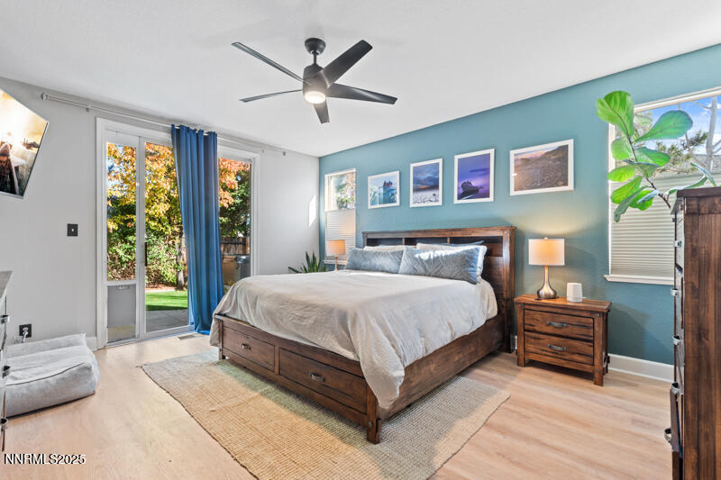 2968 Fox Trail Drive Reno, NV 89523 - Photo 8 of 24 a spacious bedroom with a bed a dresser and a window
