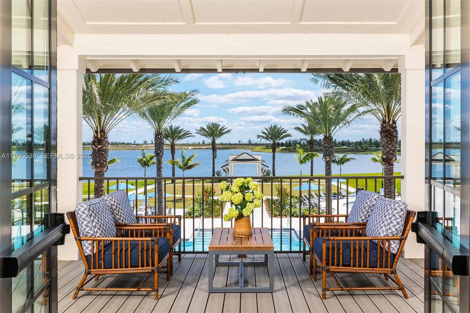 19723 Weathervane Way Loxahatchee, FL 33470 - Photo 16 of 24 a view of a balcony with furniture and wooden floor