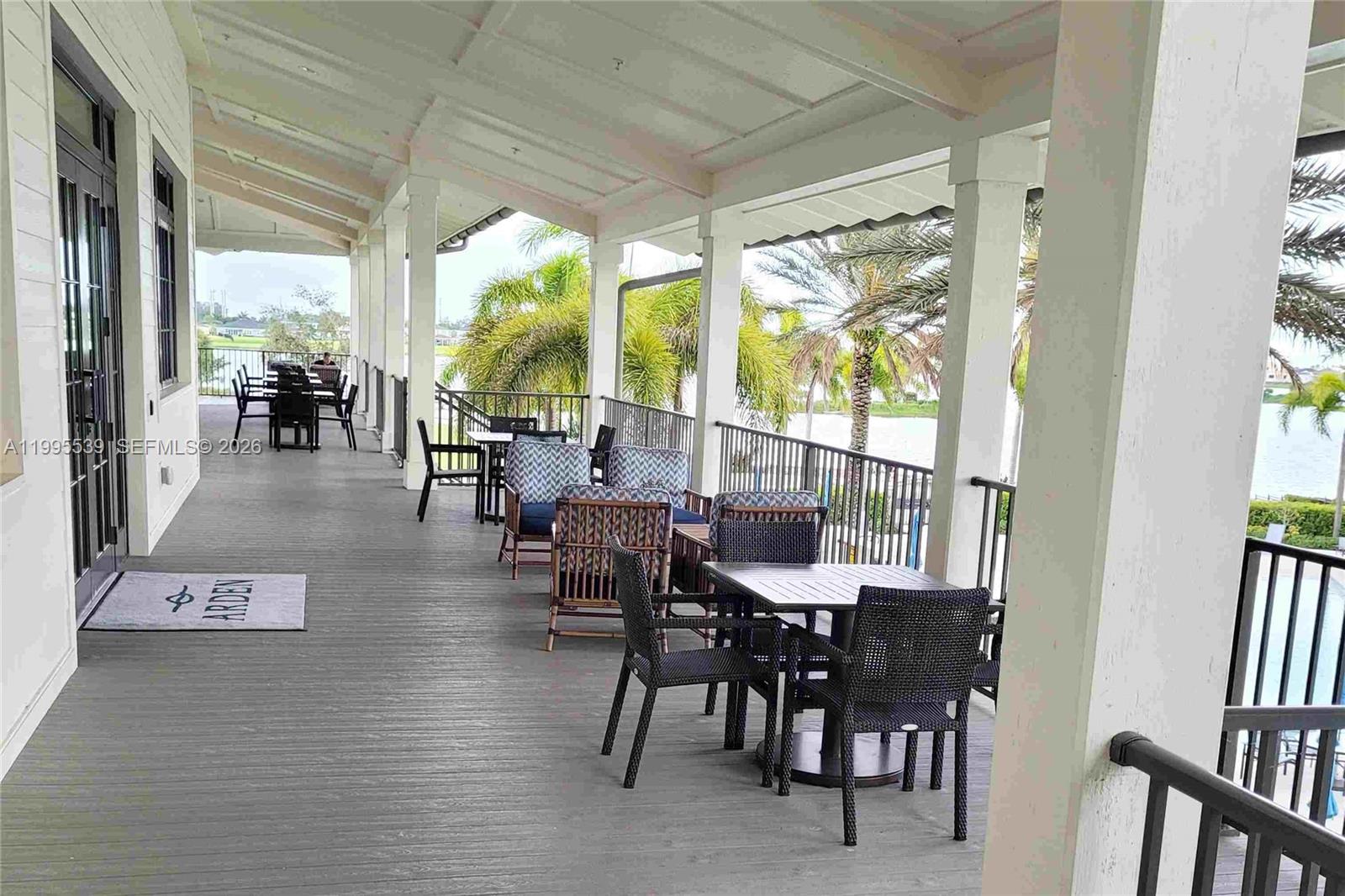 19723 Weathervane Way Loxahatchee, FL 33470 - Photo 18 of 24 a view of a dining room with furniture window and outside view