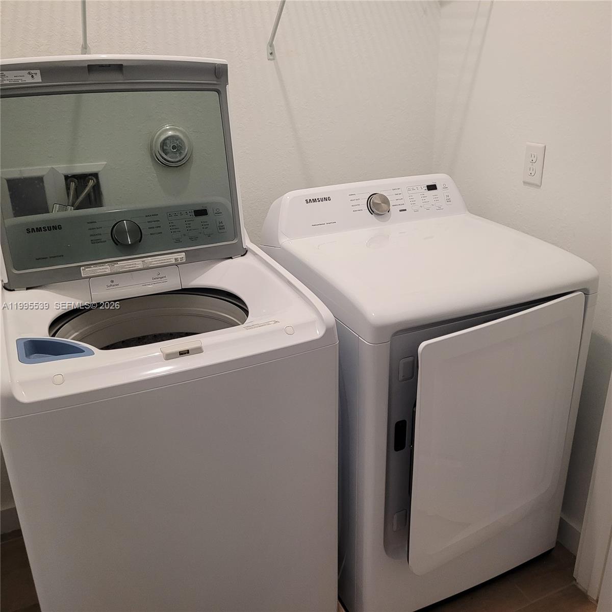 19723 Weathervane Way Loxahatchee, FL 33470 - Photo 23 of 24 a utility room with dryer and washer