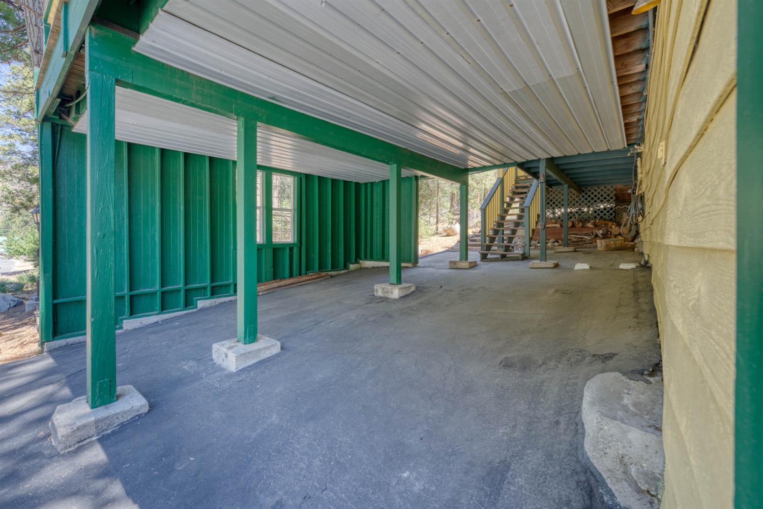 42025 Tollhouse Road Shaver Lake, CA 93664 - Photo 61 of 64 a view of a house with backyard and porch