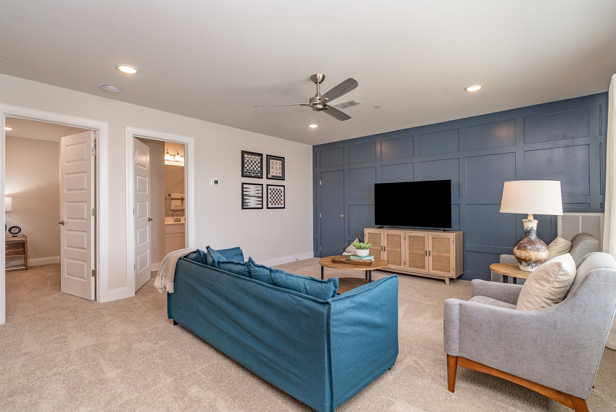 1057 Wrights Mill Road Spring Hill, TN 37174 - Photo 23 of 31 a living room with furniture and a flat screen tv