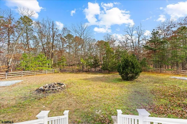a bathroom with a sink mirror and a bathtub