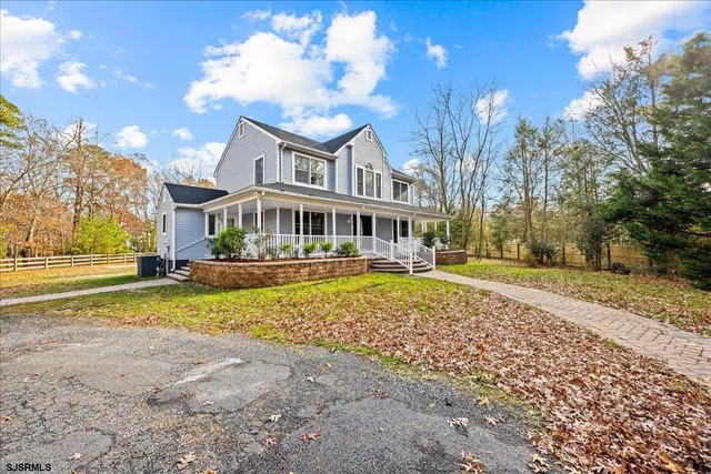 a front view of a house with swimming pool