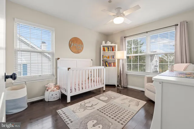 a bed room with a bed and a window