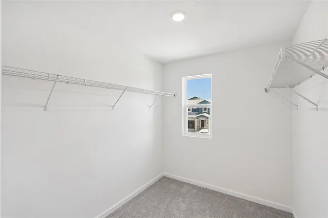 a view of a refrigerator in kitchen