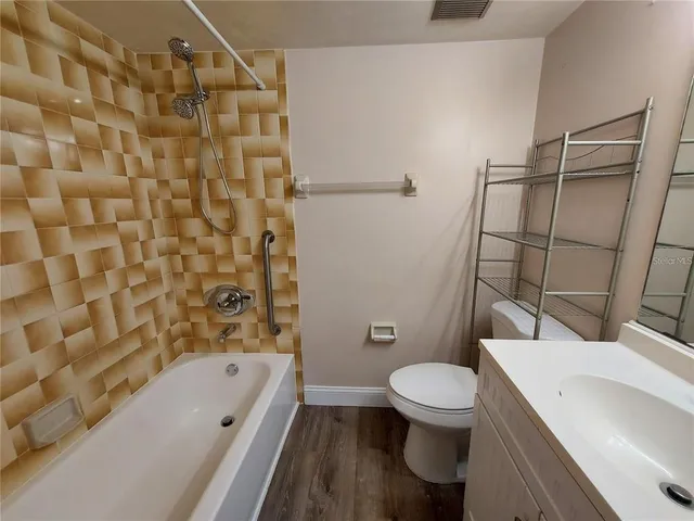 a bathroom with a toilet and a sink