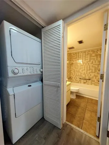 a bathroom with a toilet a sink and a shower