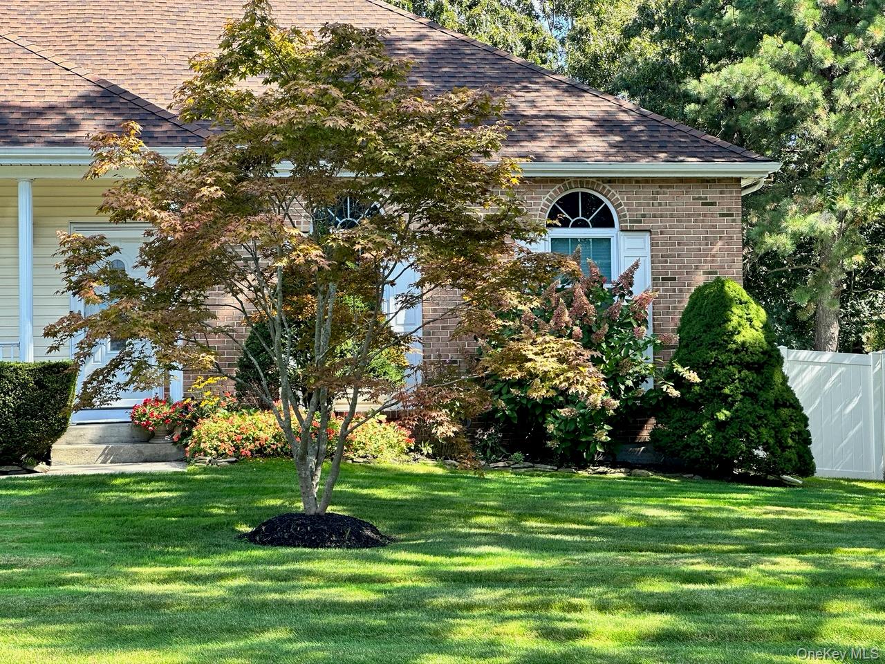 15 Timber Ridge Drive Coram, NY 11727 - Photo 2 of 35 treeinbloomfront