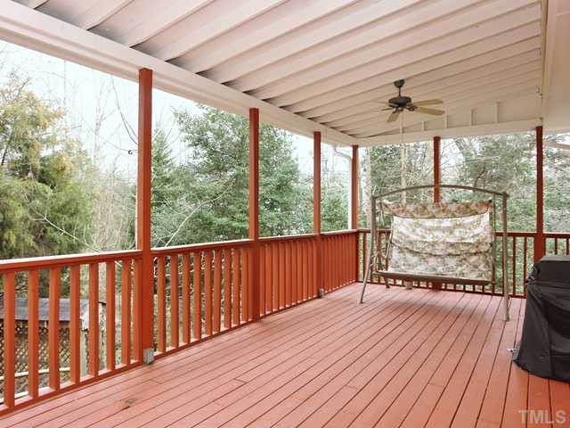 1605 Chatsworth Lane Raleigh, NC 27614 - Photo 19 of 25 Huge covered deck with ceiling fan overlooks wooded and landscaped back yard! Patio/Deck