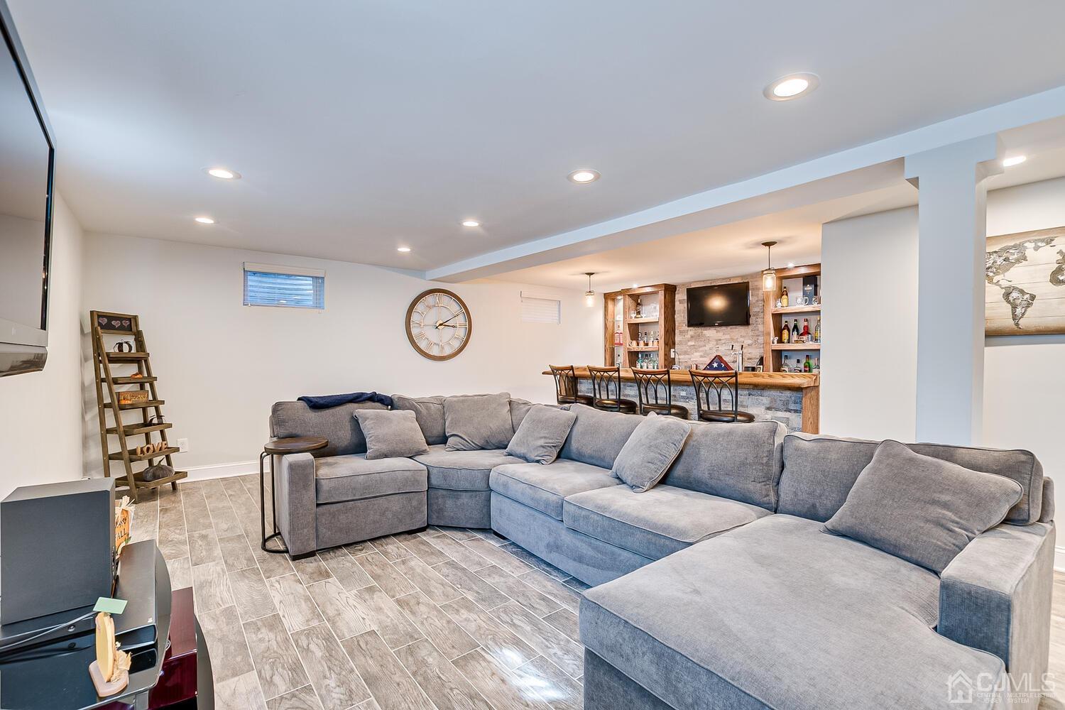 3 Normandy Road Colonia, NJ 07067 - Photo 22 of 40 a living room with furniture and a large window