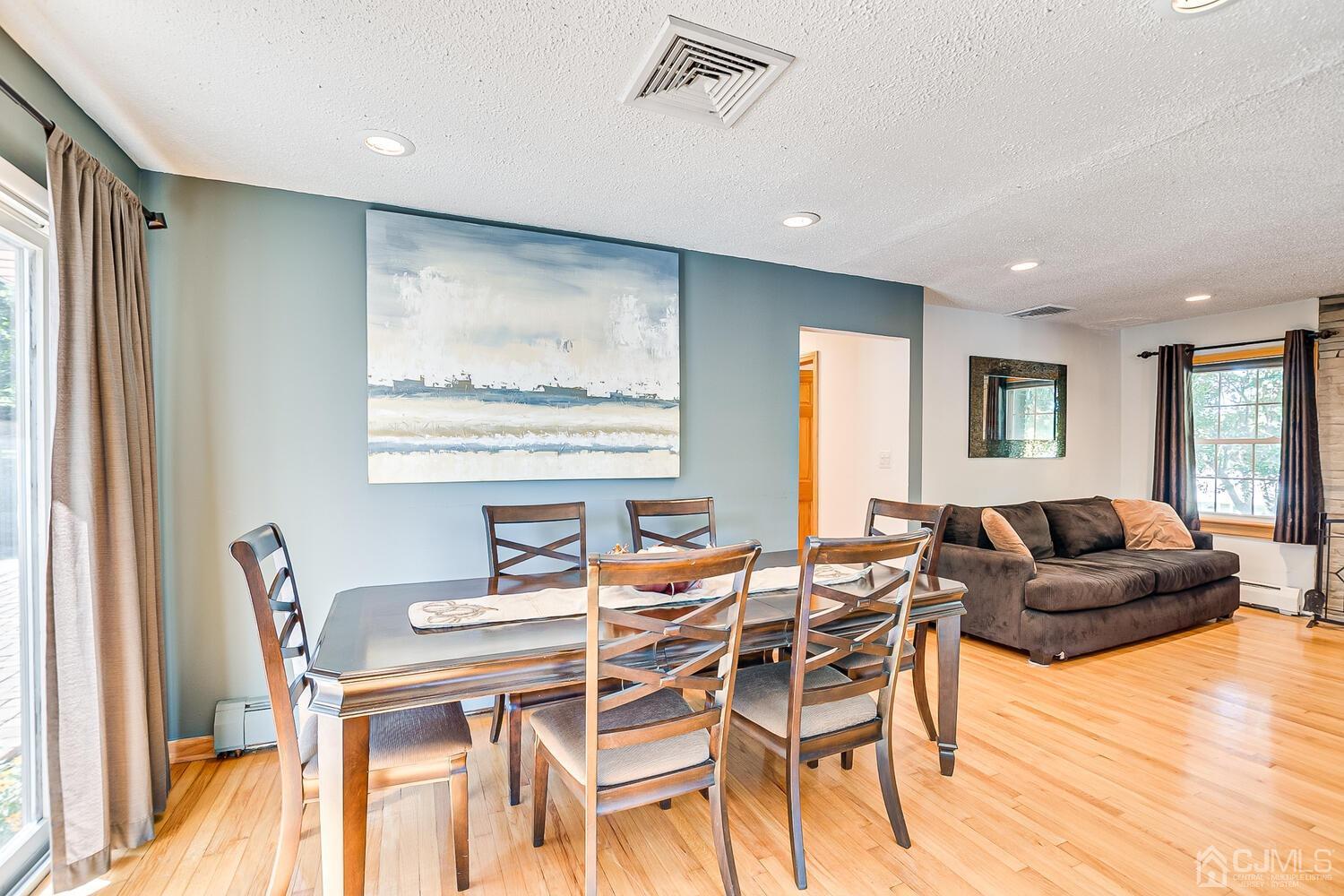 3 Normandy Road Colonia, NJ 07067 - Photo 7 of 40 a dining room with furniture and wooden floor