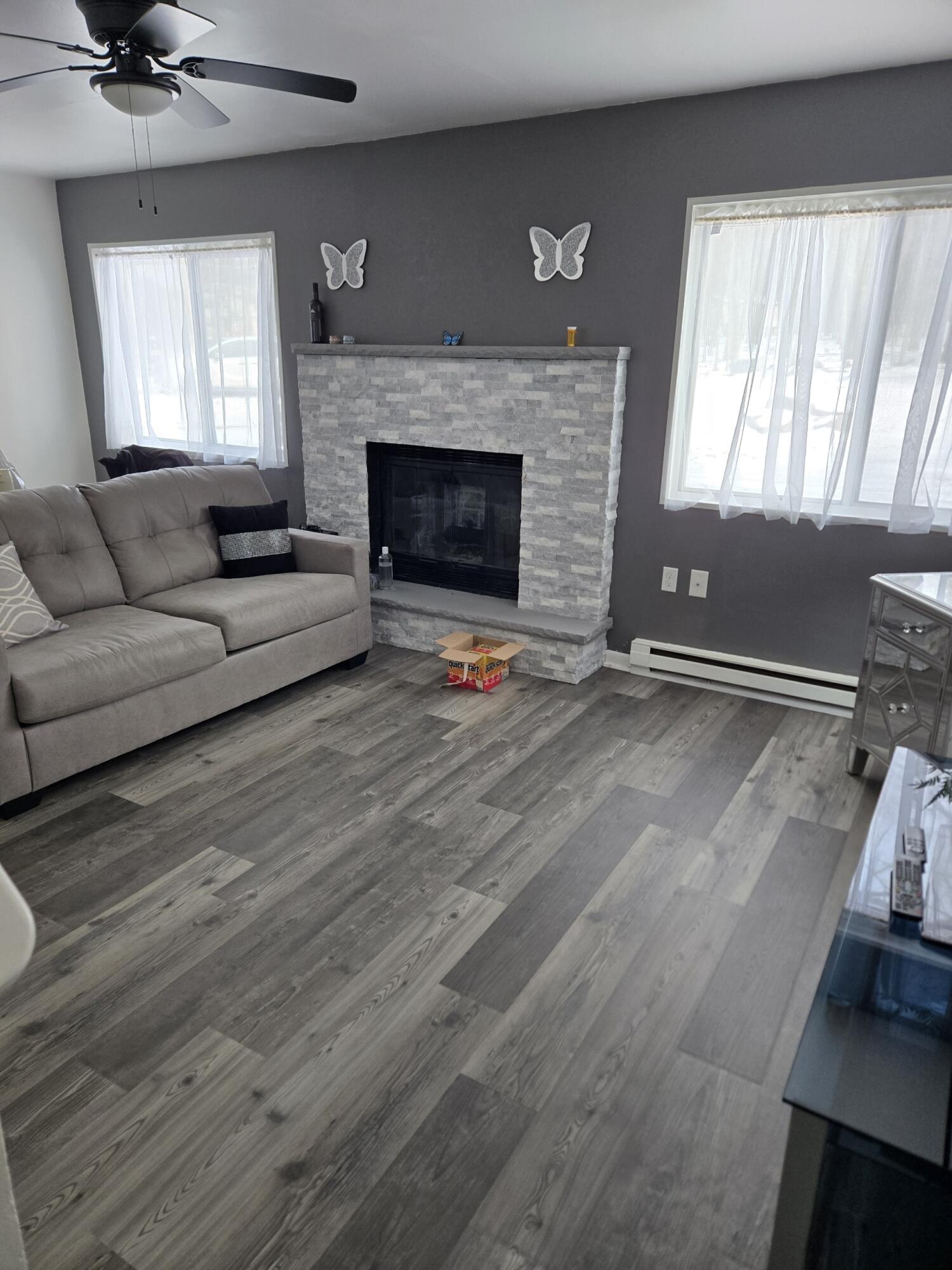 136 Huffman Circle Bushkill, PA 18324 - Photo 4 of 11 a living room with furniture and a fireplace