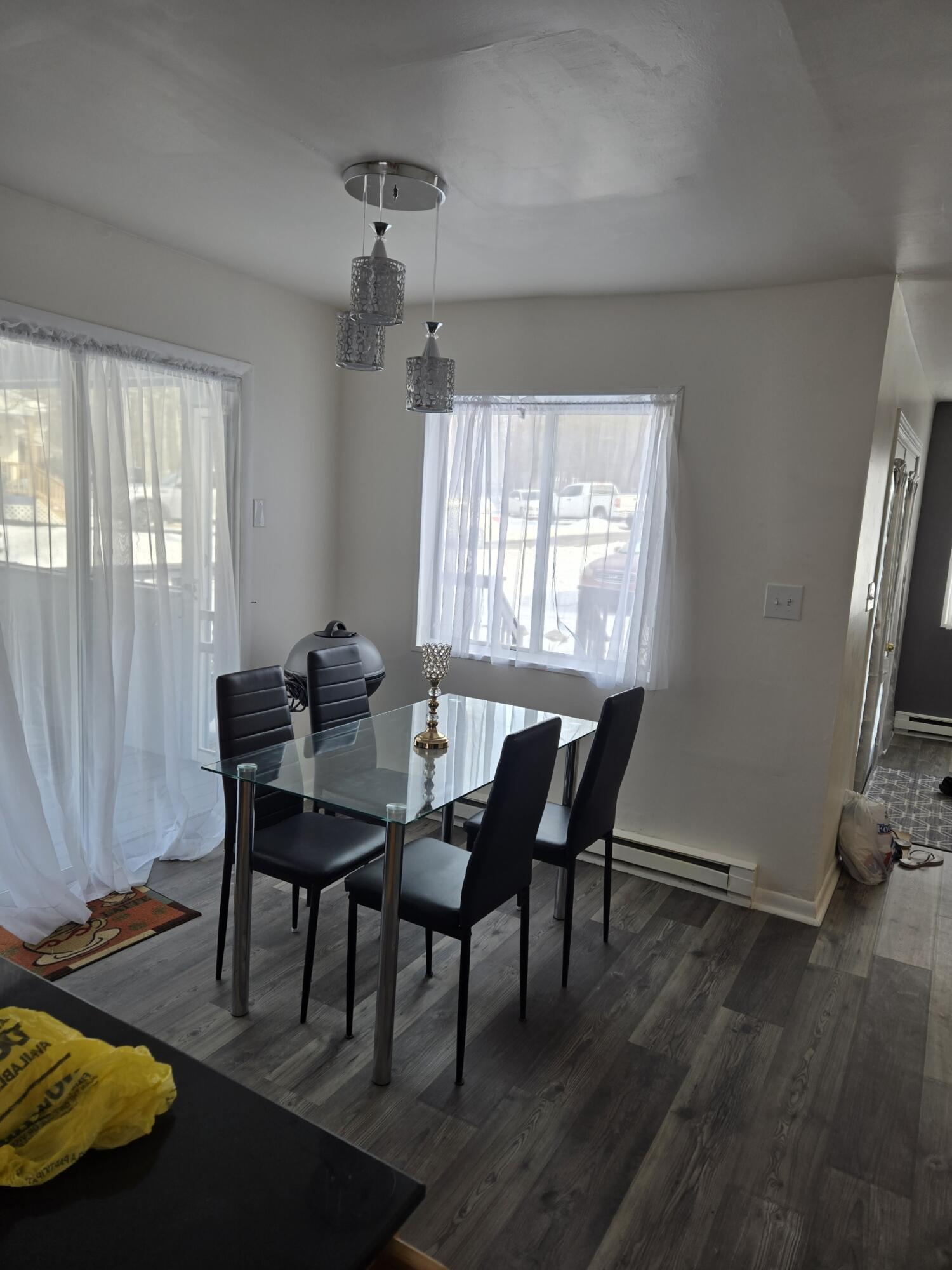 136 Huffman Circle Bushkill, PA 18324 - Photo 9 of 11 a view of a dining room with furniture and wooden floor
