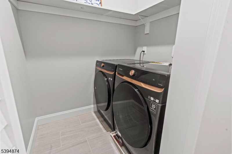 53 Marcy Avenue, Unit 1 East Orange, NJ 07017 - Photo 18 of 23 a utility room with dryer and washer
