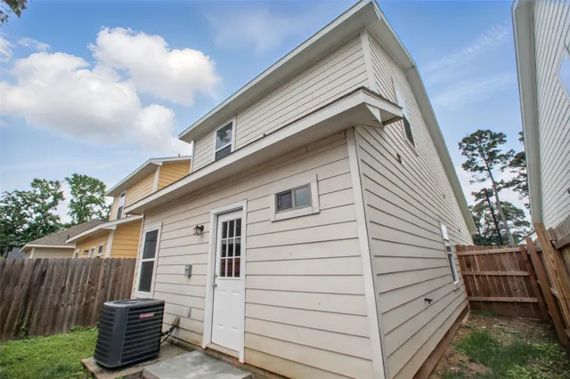 a view of a back yard of the house