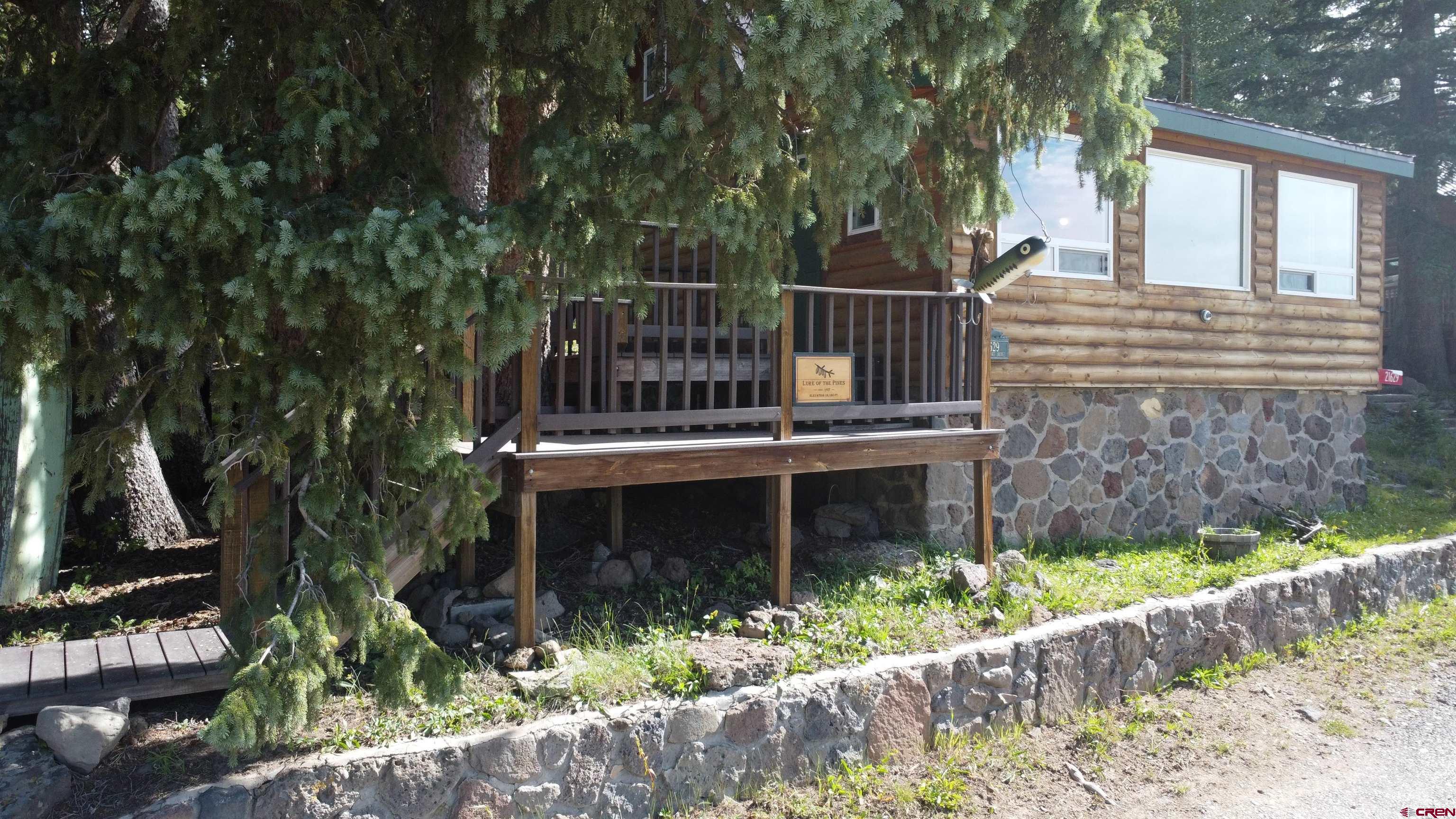 21629 Baron Lake Drive Cedaredge, CO 81413 - Photo 5 of 34 a view of a house with a yard