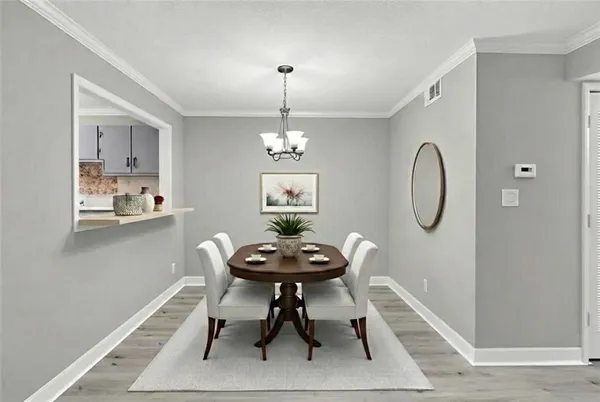 a room with furniture and chandelier