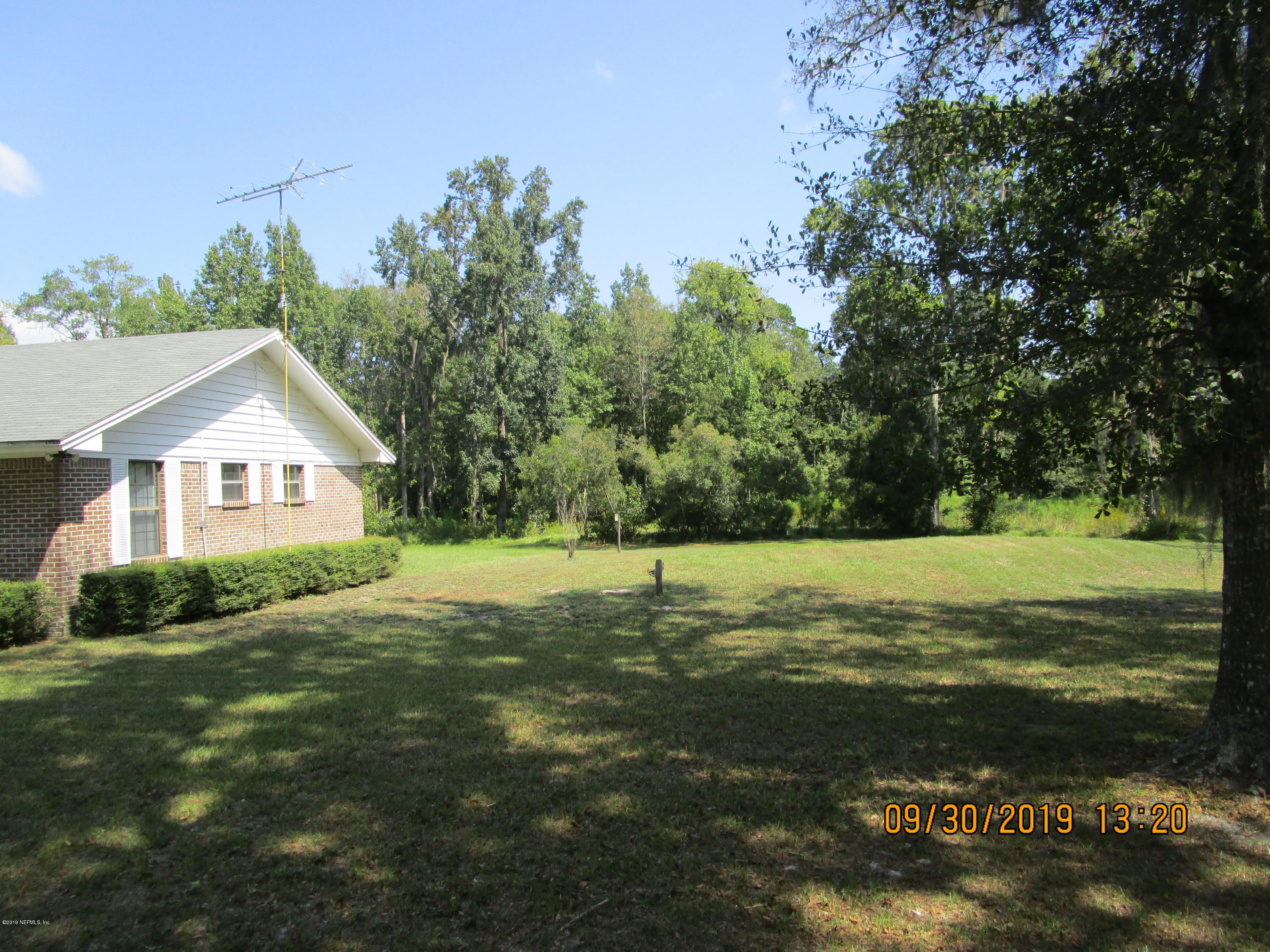 43076 Thomas Creek Road Callahan, FL 32011 - Photo 3 of 17 Side