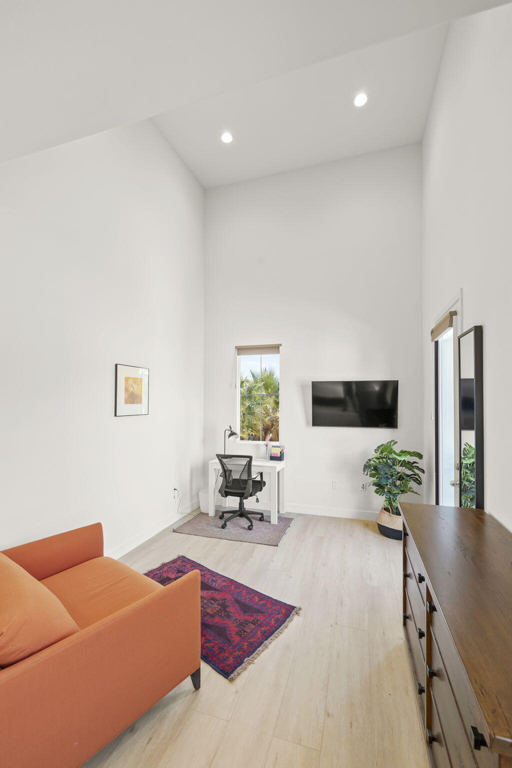 2339 Nicklaus Street Oxnard, CA 93036 - Photo 25 of 50 a living room with furniture rug and wooden floor