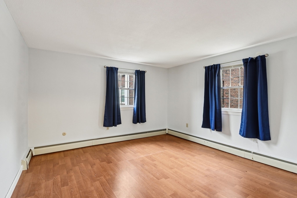 3 Drummer Road, Unit B3 Acton, MA 01720 - Photo 10 of 16 an empty room with windows