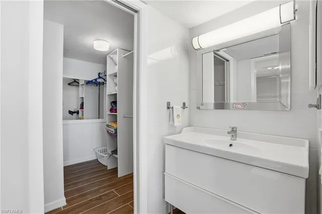 a view of a hallway with washer and dryer