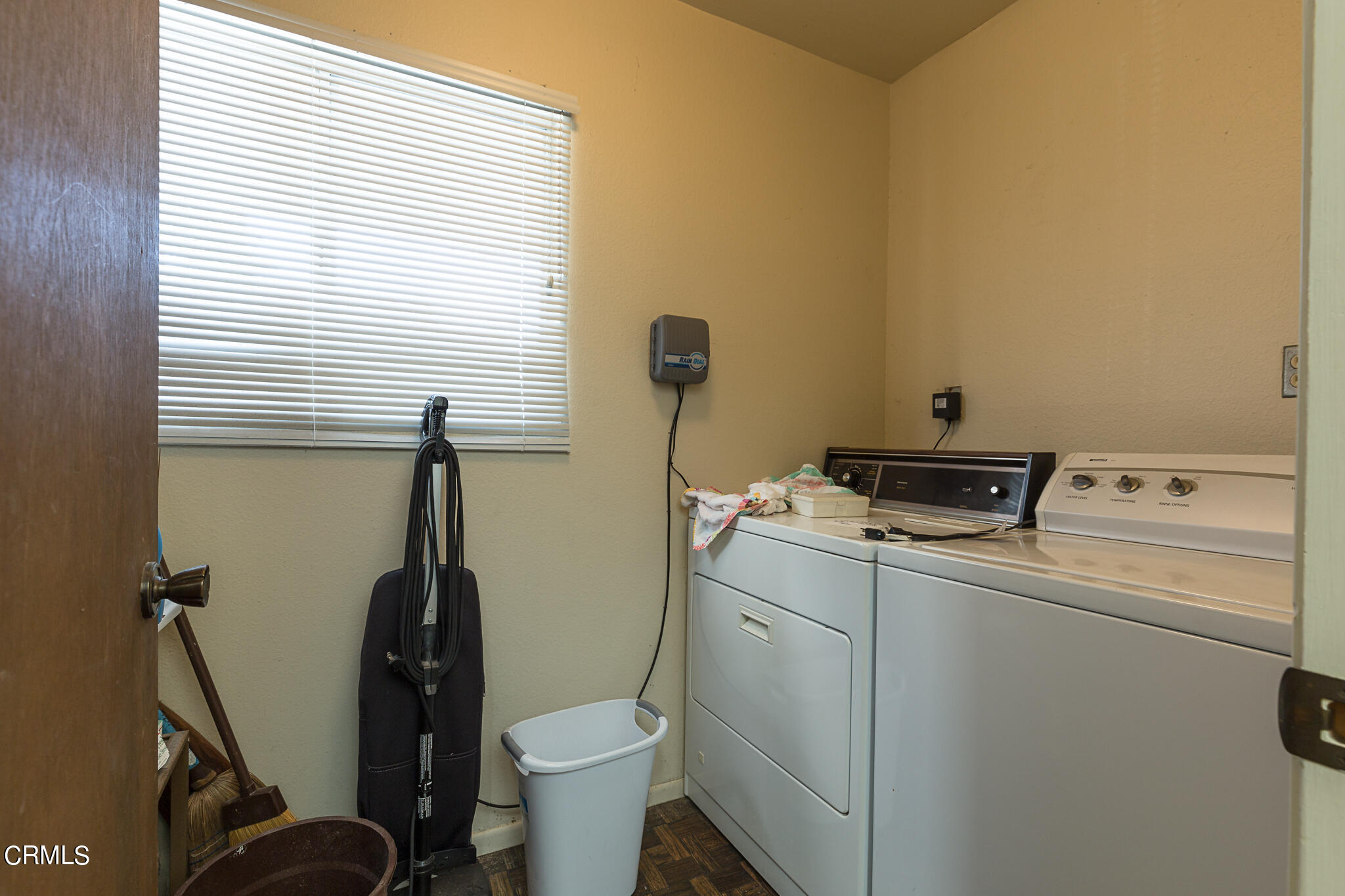 5036 West Wooley Road Oxnard, CA 93035 - Photo 5 of 21 a bathroom with a toilet sink and tub