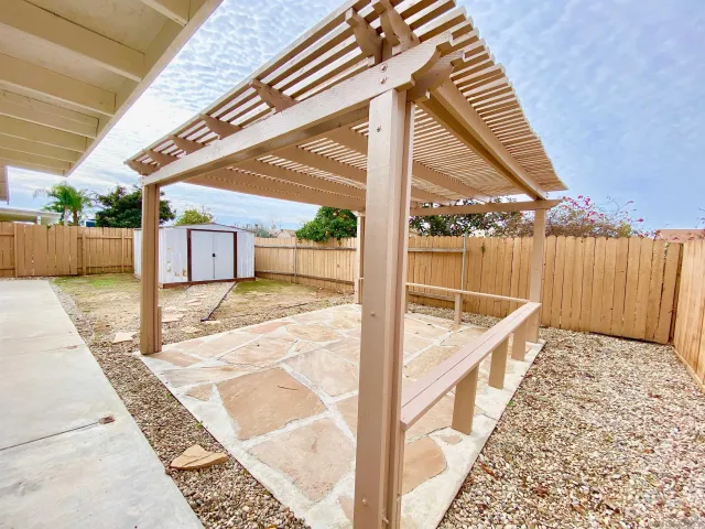 a living room with furniture fireplace and a window