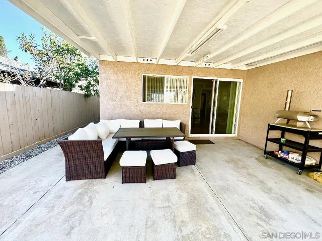 a view of a house with a tree