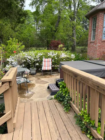 a front view of a residential houses with yard