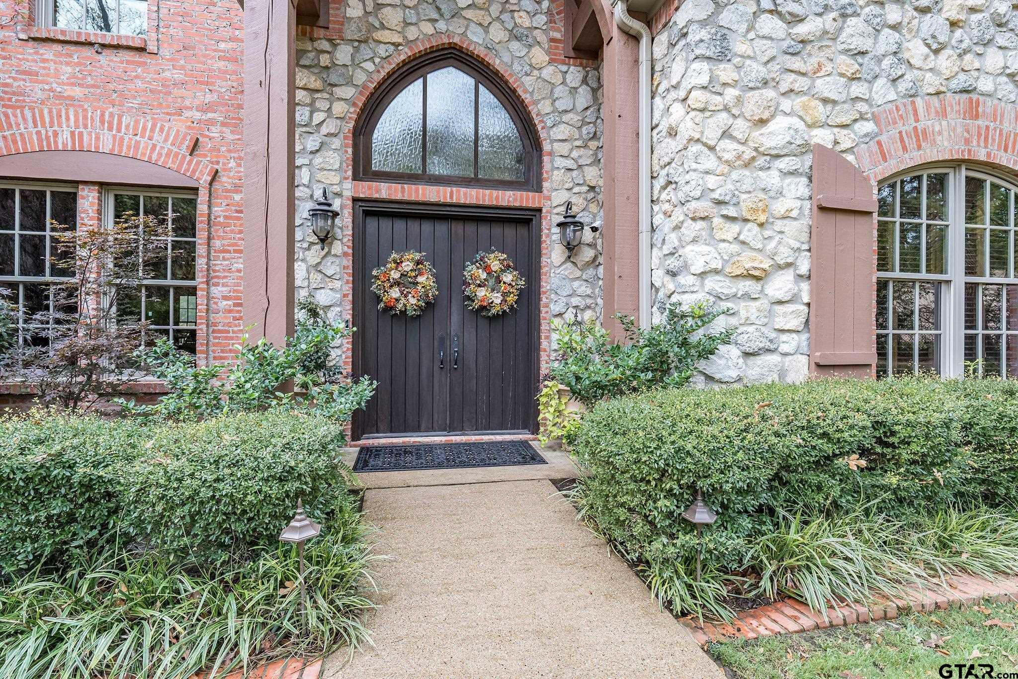 17654 Southpoint Road Whitehouse, TX 75791 - Photo 3 of 47 IMPRESSIVE ENTRY W/DOUBLE WOODEN DOORS ENHANCED BY ARCHED WINDOWS.