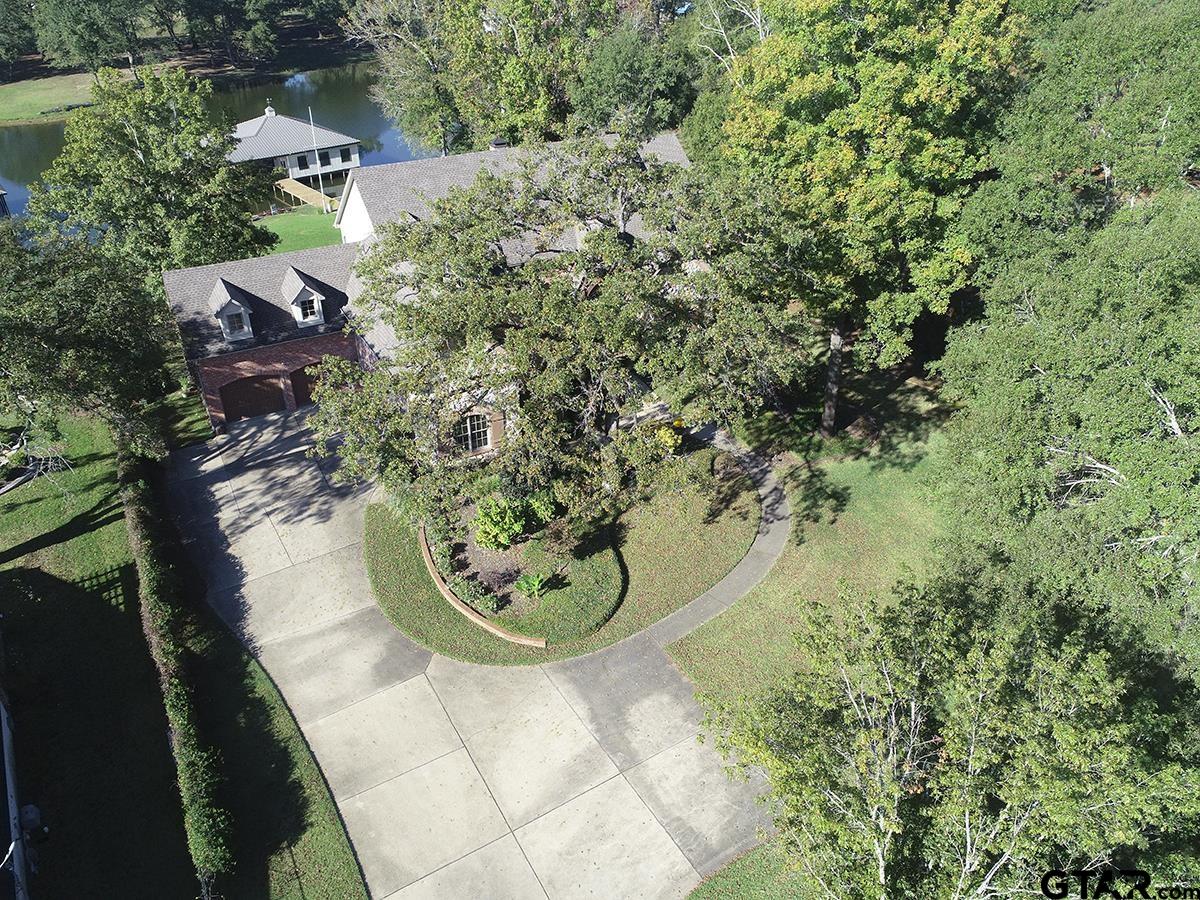 17654 Southpoint Road Whitehouse, TX 75791 - Photo 45 of 47 an aerial view of a house with a yard and large trees