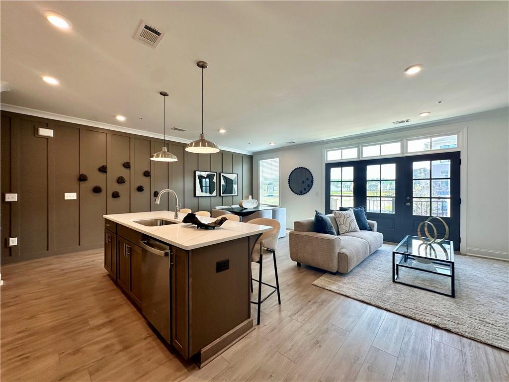 502 Alice Way, Unit D21 Cumming, GA 30040 - Photo 11 of 52 a kitchen that has a lot of cabinets in it