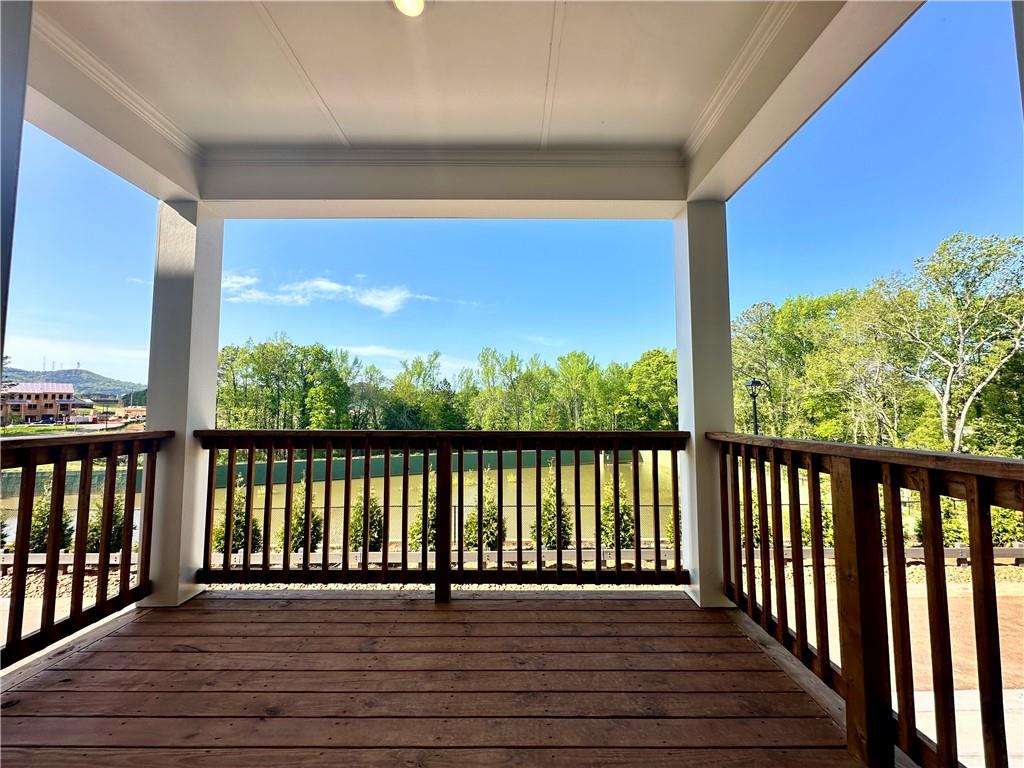 502 Alice Way, Unit D21 Cumming, GA 30040 - Photo 12 of 52 a view of balcony with wooden floor