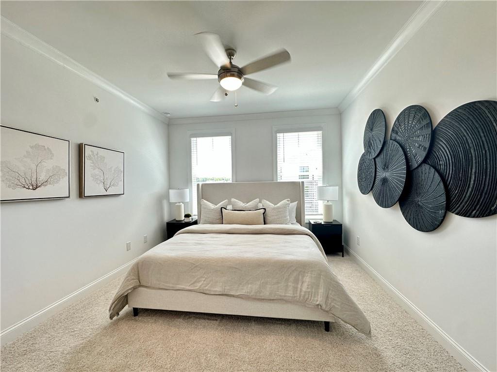 502 Alice Way, Unit D21 Cumming, GA 30040 - Photo 15 of 52 a bedroom with bed and window